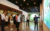 广东健力宝林毅一行莅临万宁溪地阳光考察诺丽产业共谋发展